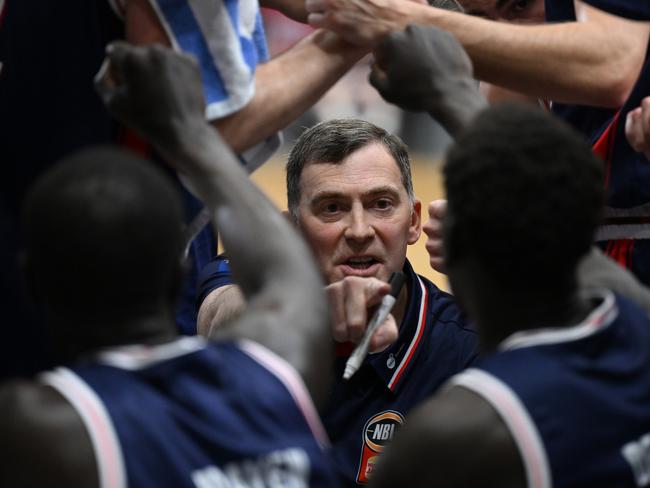 GOLD COAST, AUSTRALIA - SEPTEMBER 13: Mike Wells head coach of the 36ers speaks to his players during the 2024 NBL Blitz match between Adelaide 36ers and South East Melbourne Phoenix at Gold Coast Sports and Leisure Centre on September 13, 2024 in Gold Coast, Australia. (Photo by Matt Roberts/Getty Images)