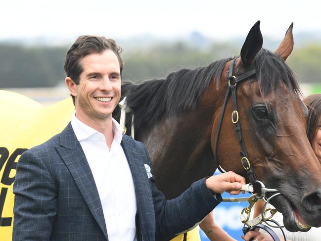 Trainer Michael Kent Jnr (left) celebrates a win at Ballarat on December 7. Picture: Brett Holburt/Racing Photos via Getty Images