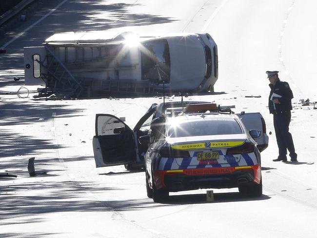 Highway patrol officers at the scene of an accident on Alfords Point Rd, Menai. Union sources say they need more experienced officers to train the troops on the road. Picture: John Appleyard