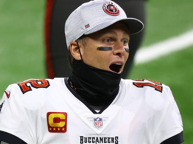 DETROIT, MICHIGAN - DECEMBER 26: Tom Brady #12 of the Tampa Bay Buccaneers reacts during the third quarter of a game against the Detroit Lions at Ford Field on December 26, 2020 in Detroit, Michigan.   Rey Del Rio/Getty Images/AFP == FOR NEWSPAPERS, INTERNET, TELCOS & TELEVISION USE ONLY ==