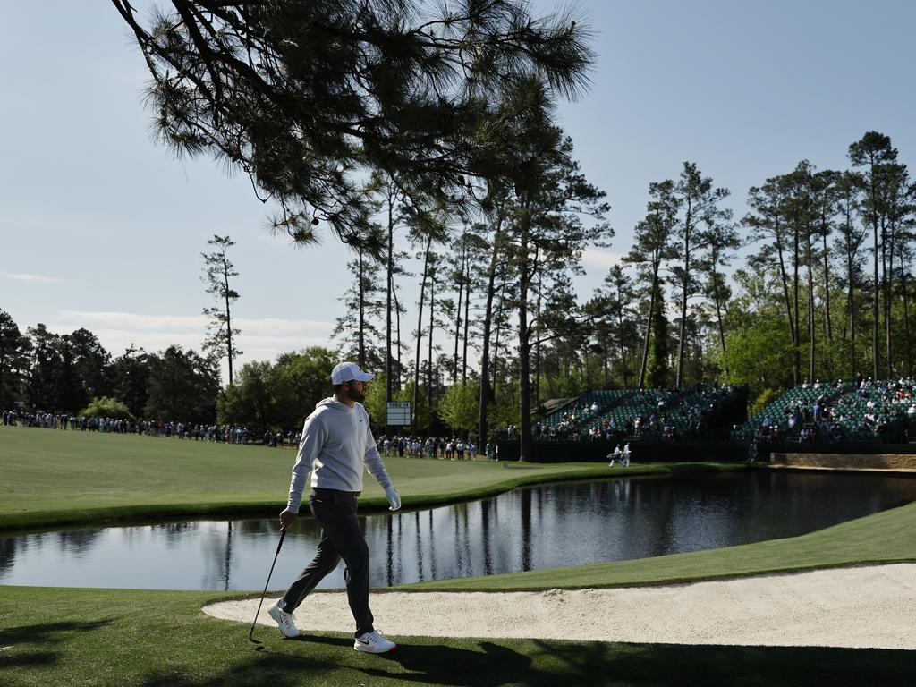 Scottie Scheffler walks the glorious course as he approaches the 15th green. Picture: Getty