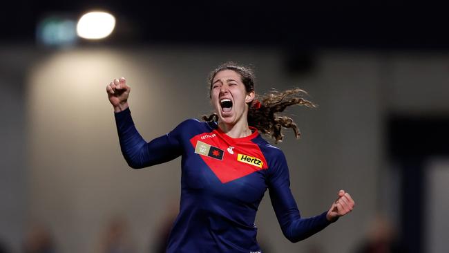 Alyssa Bannan jumps for joy after a Demons goal. Picture: Michael Willson/AFL Photos via Getty Images.