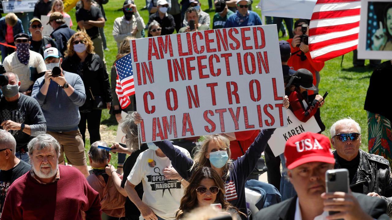 Barbers and stylists offered free haircuts as part of the Operation Haircut rally. Picture: AFP