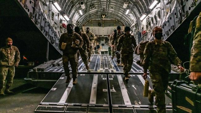 US troops from the 82nd Airborne division land at Wiesbaden, Germany, on the weekend. Picture: AFP