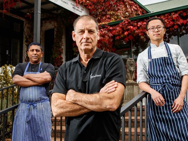 28/4/2020 Andrew Friebe with staff members Sujith Gonsalkorala and Chun-Yang Li (Jimmy)  at Maximilians. Andrew Friebe at the plight Maximilians restaurant has been paying staff members with VISA restrictions out of his own pocket. Picture MATT TURNER.