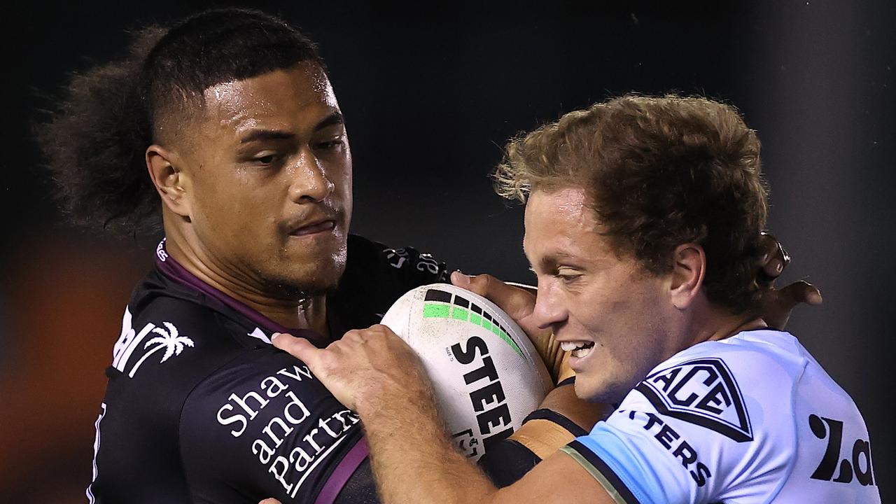 Haumole Olakau'atu is facing 1-2 weeks on the sideline of the Sea Eagles is tackled by Matt Moylan of the Sharks during the round seven NRL match between the Cronulla Sharks and the Manly Sea Eagles at PointsBet Stadium on April 21, 2022, in Sydney, Australia. (Photo by Cameron Spencer/Getty Images)