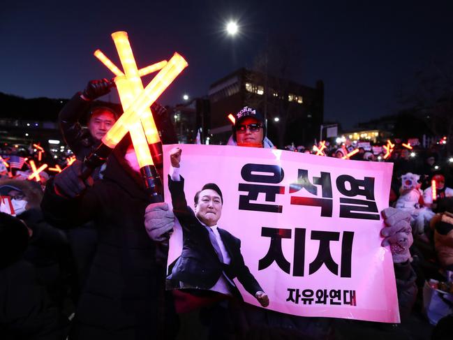 Supporters of impeached South Korean President Yoon Suk Yeol stage a rally near the presidential residence on December 31, 2024 in Seoul, South Korea. Picture: Chung Sung-Jun/Getty Images