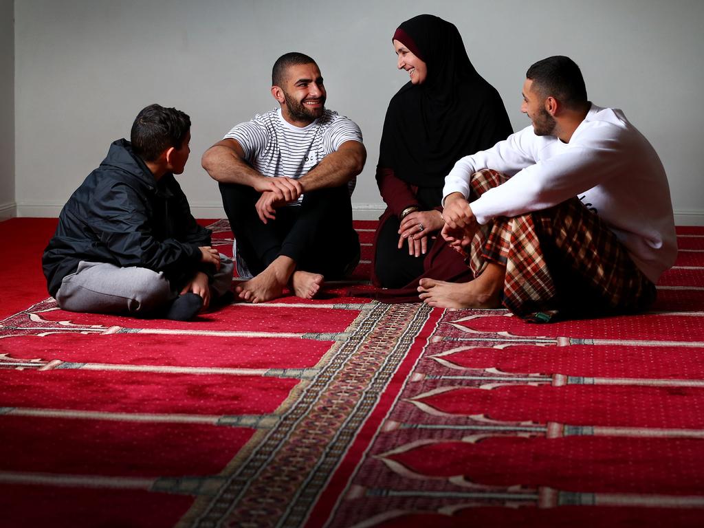 Adam with members of his family family including Noah 13, Nejme (mum) and Muhammad at the Gold Coast Mosque. Picture: Adam Head