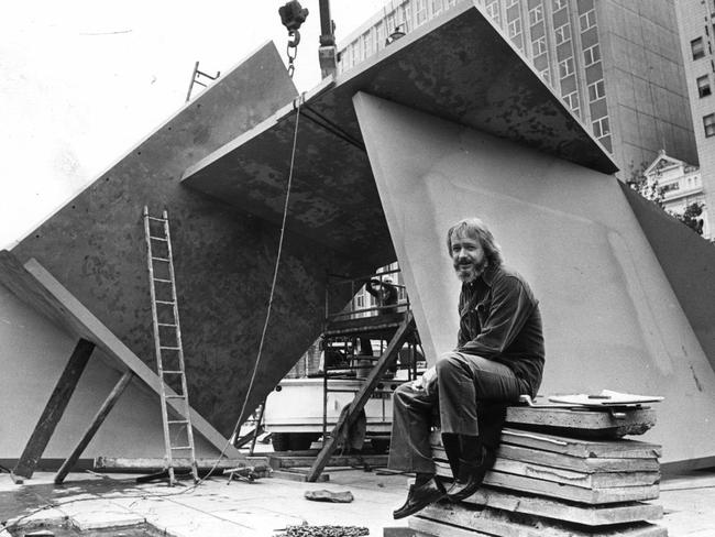 Sculptor Ron Robertson-Swann with his work "The Vault" (also known as the Yellow Peril) in the City Square, 1980.