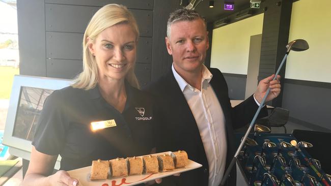 Senior brand manger Selena Magill and CEO Kirk Edwards at Top Golf, Gold Coast. Photo: Kate Paraskevos                        <a class="capi-image" capiId="8754ee19bc4b43e1f038ebd157101fcd"></a>