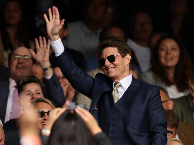 Tom Cruise watches the Ladies' Singles Final match.