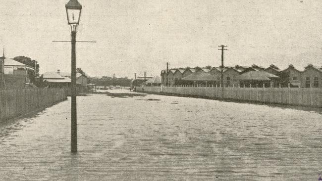 The new railway workshops in Bolsover Street during the 1918 floods in Rockhampton. Photo courtesy State Library of Queensland.