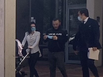 Samir Ayoub (centre) outside Campbelltown Local Court with his partner and lawyer. Picture: Lauren Ferri