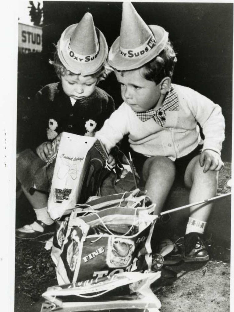 Royal Adelaide Show, date unknown. Two children enjoying their showbags.