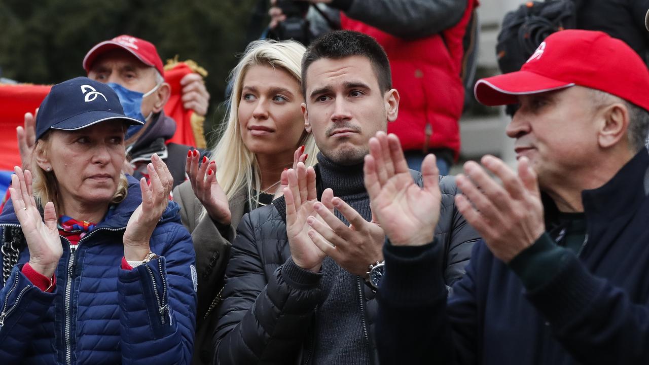 Dijana Djokovic (L) Djordje Djokovic (C) and Srdjan Djokovic (R), the family of Serbian tennis player Novak Djokovic attends a rally in front of Serbia's National Assembly as World No. 1 tennis player Novak Djokovic fights deportation from Australia.