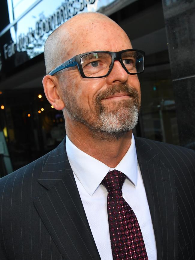 Former Victoria Police Chief Commissioner Simon Overland becomes visibly emotional while answering questions at the Royal Commission on Wednesday. Picture: AAP