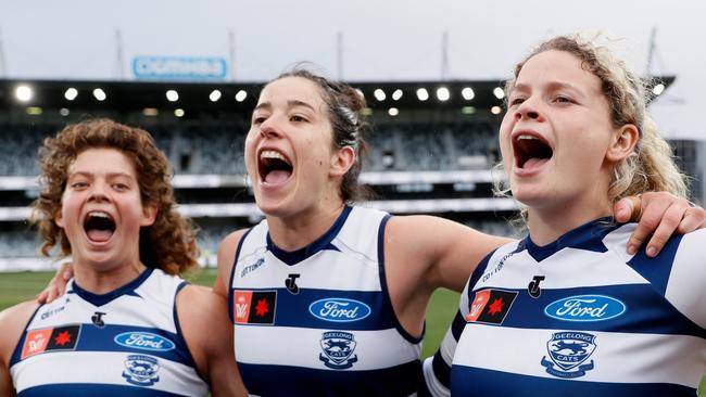 Nina Morrison, Jacqueline Parry and Georgie Prespakis after a win against Sydney at GMHBA Stadium in October, 2022. Picture: Dylan Burns/AFL Photos via Getty Images.