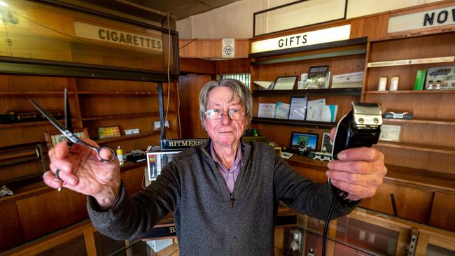 Tony Porter has been wielding the scissors and razor at Sammy’s Barber Shop for more than 30 years. Picture: Jake Nowakowski