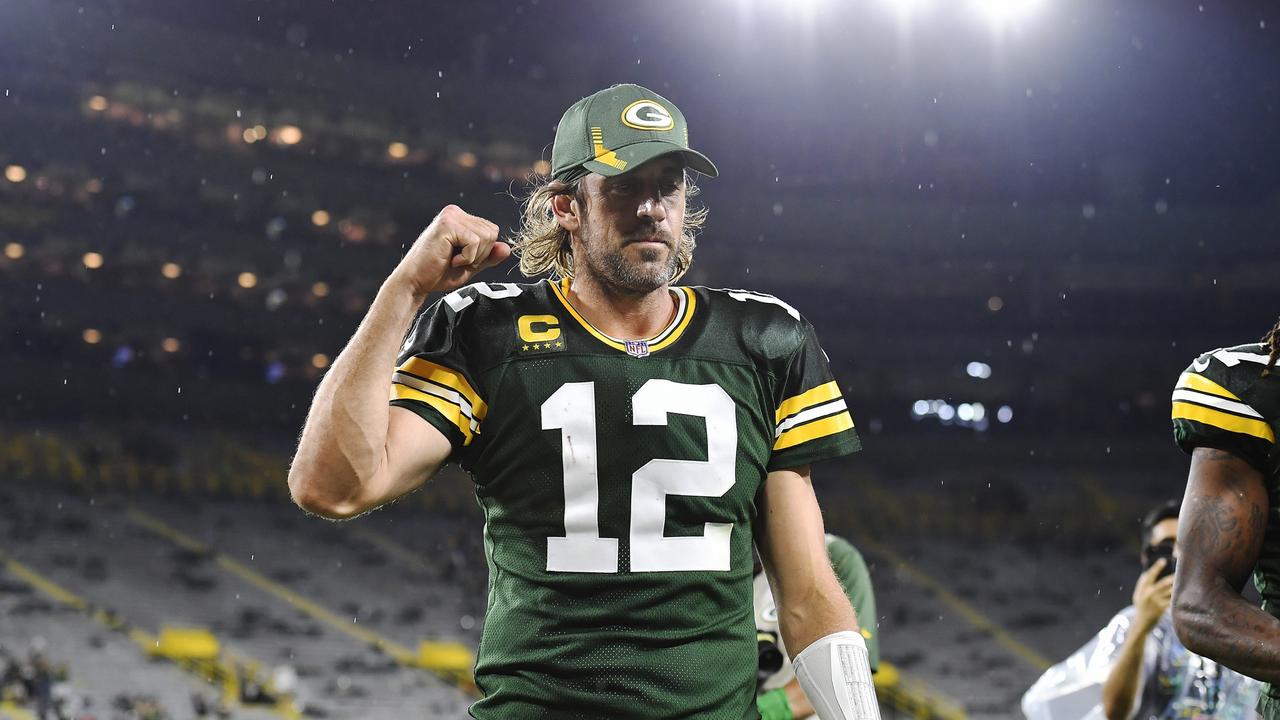 Aaron Rodgers #12 of the Green Bay Packers reacts as he walks off the field following the team's win against the Detroit Lions. Photo: Getty Images