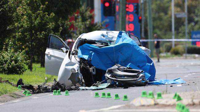 The scene where two people have been killed after a stolen car smashed into a power pole in Melbourne’s north. Picture: Brendan Beckett