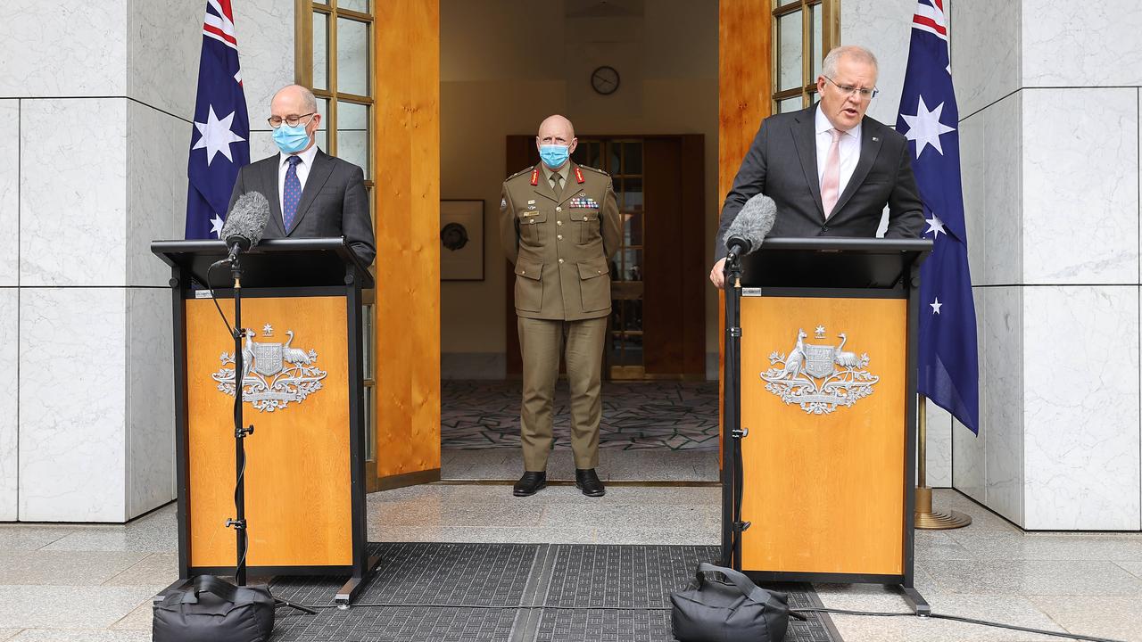 The PM with COVID-19 Taskforce Commander, Lieutenant-General, John Frewen. Australia's Chief Medical Officer, Professor Paul Kelly. Picture: NCA NewsWire / Gary Ramage