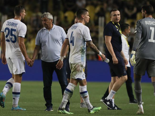 Dynamo Kyiv players and head coach Mircea Lucescu celebrate their win against Fenerbahce. Picture: Getty Images