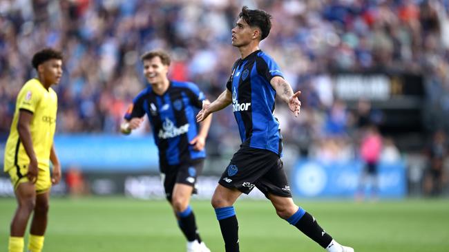 AUCKLAND, NEW ZEALAND – FEBRUARY 22: Logan Rogerson of Auckland FC celebrates after scoring a goal during the round 20 A-League Men match between Auckland FC and Wellington Phoenix at Go Media Stadium, on February 22, 2025, in Auckland, New Zealand. (Photo by Hannah Peters/Getty Images)