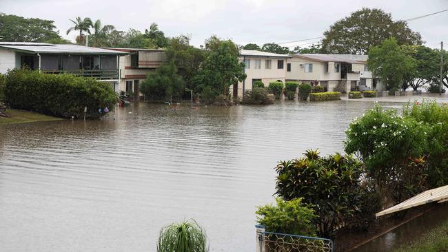 Flooded streets in Ingham. Picture: Adam Head