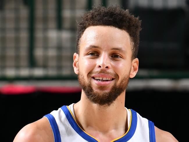 DALLAS, TX - FEBRUARY 6: Stephen Curry #30 of the Golden State Warriors smiles during the game against the Dallas Mavericks on February 6, 2021 at the American Airlines Center in Dallas, Texas. NOTE TO USER: User expressly acknowledges and agrees that, by downloading and or using this photograph, User is consenting to the terms and conditions of the Getty Images License Agreement. Mandatory Copyright Notice: Copyright 2021 NBAE (Photo by Glenn James/NBAE via Getty Images)