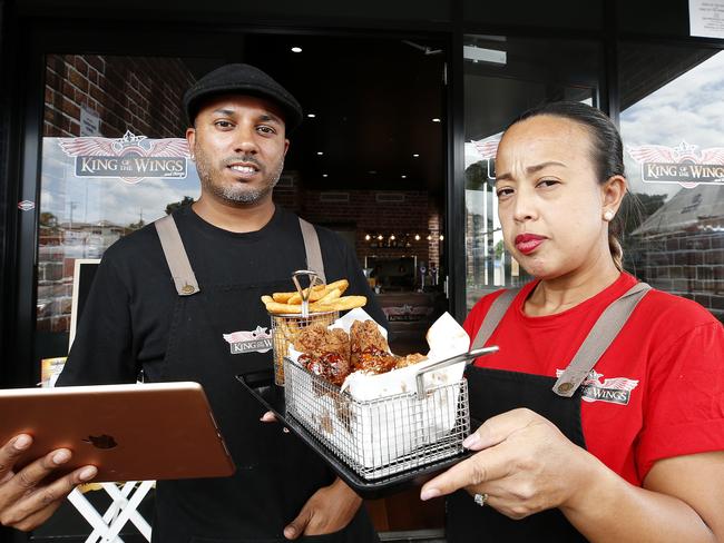 Dylan Pires and Katrina Pires from King of the Wings at Stafford, Brisbane 9th of February 2021.  Someone pretending to be King of the Wings is delivering chicken wings through Uber Eats.  (Image/Josh Woning)