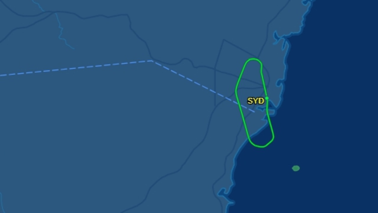 Qantas flight reports emergency, circles over Sydney