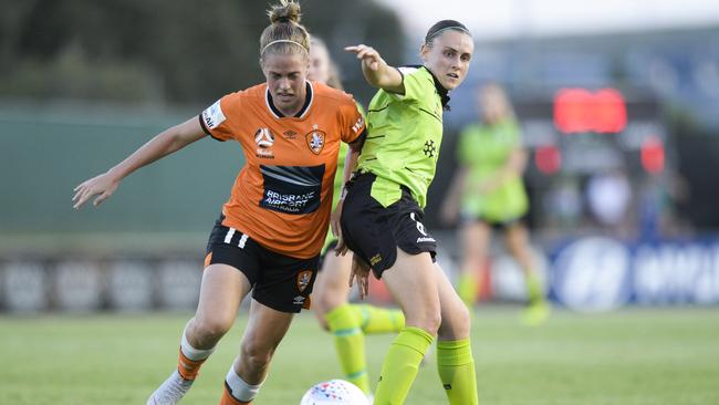 Natalie Tathem of Brisbane (left) and Olivia Price of Canberra compete for the ball on Thursday night. Picture: AAP 