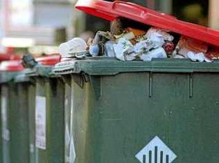 BIN BANDITS: Some less-than-lovely residents are using the temporary closure of the Lismore tip to unload their rubbish under the cover of darkness into their neighbours bins. Picture: Peter Gardiner