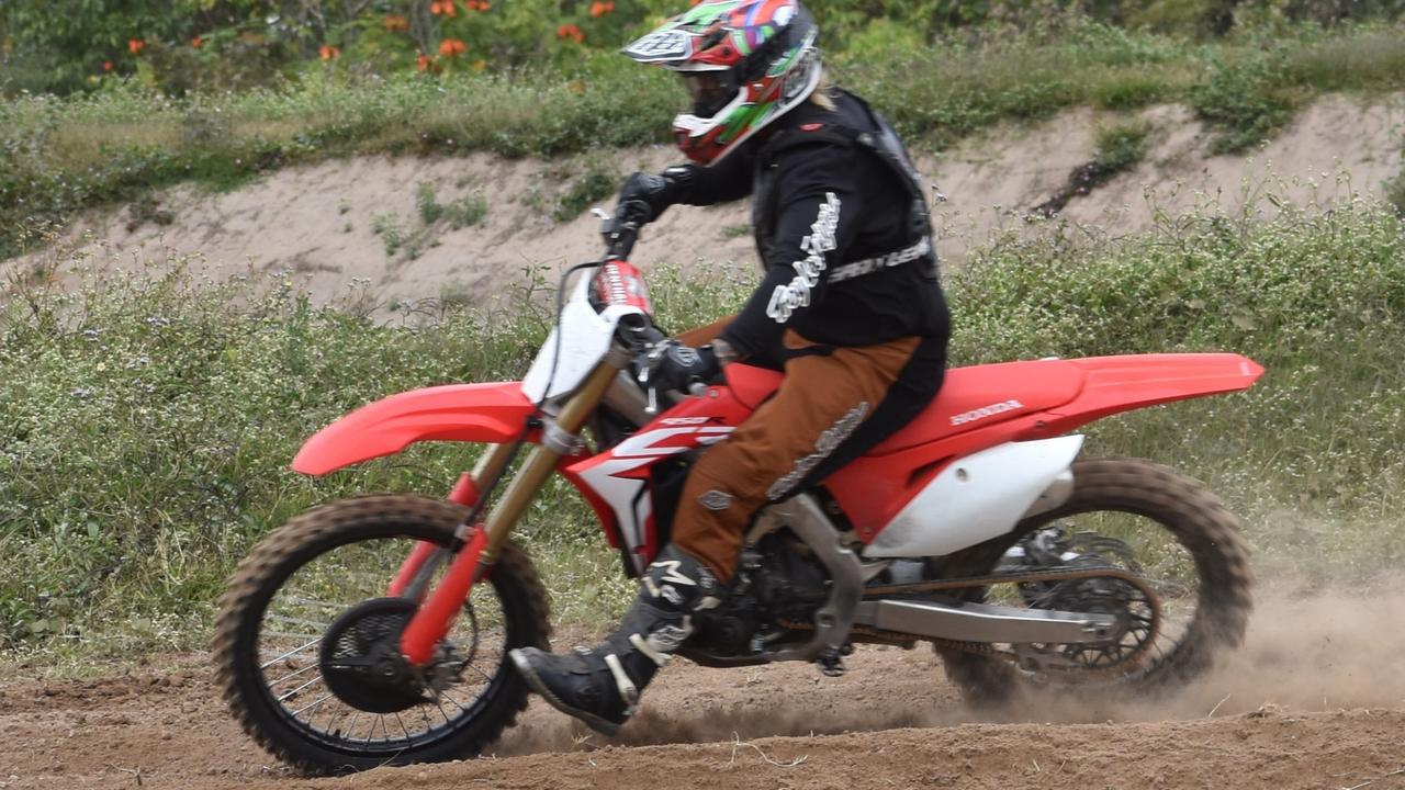 A man has suffered a suspected broken leg in a dirt bike accident