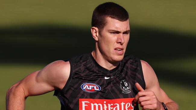 At 211cm, Cox is tallest player ever to run out for the Magpies. Picture: Michael Klein