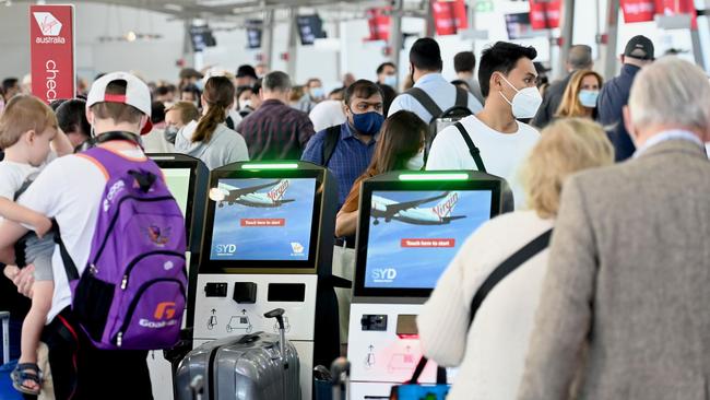 Holiday makers queue at check-in at Sydney’s domestic terminal. Picture: NCA NewsWire / Jeremy Piper