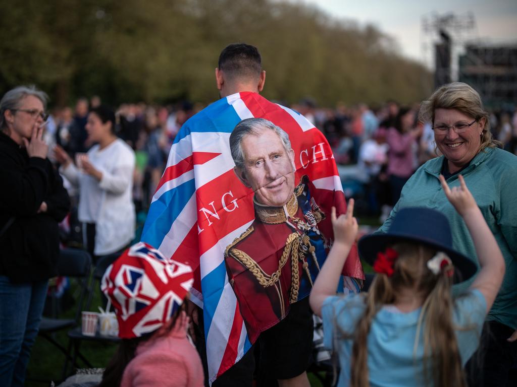 Charles face was splashed on souvenirs. Picture: Getty Images