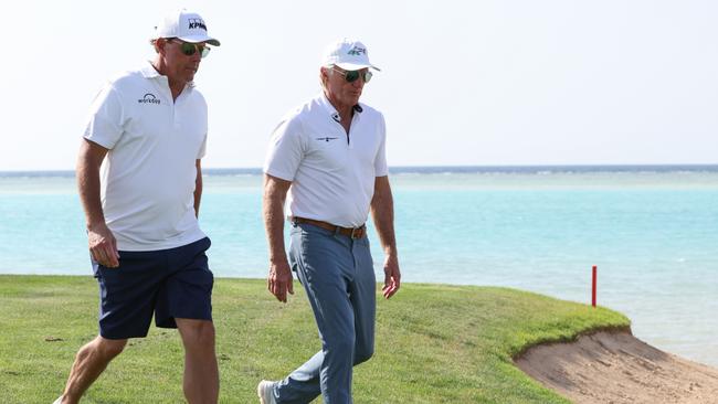 Phil Mickleson chats with Greg Norman.