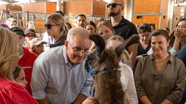 The PM’s security team watches on as onlookers swirl around them. Picture: Jason Edwards