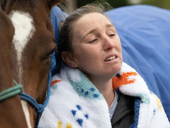 A distraught Karin Huddle outside her family home on Wednesday. Picture: Brad Fleet