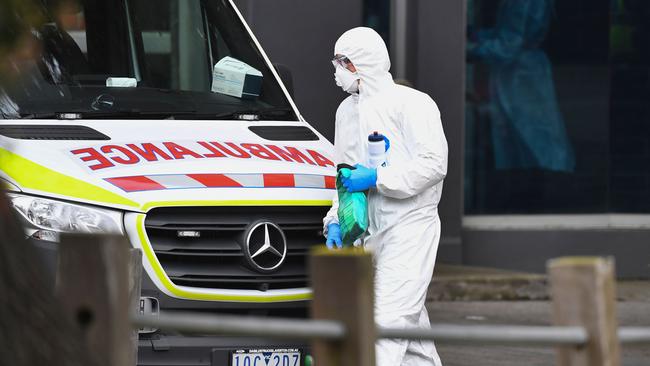 An ambulance is seen outside one of nine public housing estates locked down due to a spike in COVID-19 coronavirus numbers in Melbourne on July 6, 2020. Picture: William West