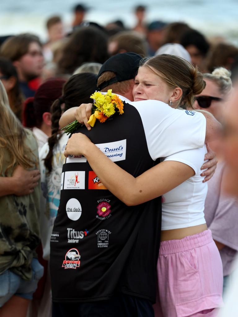 Hundreds of people have gathered at Bribie Island for a vigil to honour 17-year-old shark attack victim Charlize Zmuda. Picture: David Clark