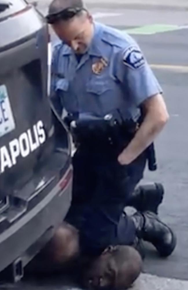 FILE - In this file frame from May 25, 2020, video provided by Darnella Frazier, a Minneapolis officer kneels on the neck of George Floyd, a handcuffed man who was pleading that he could not breathe. In the two weeks since FloydÃ¢â&#130;¬â&#132;¢s killing, police departments have banned chokeholds, Confederate monuments have fallen and officers have been arrested and charged. The moves come amid a massive, nationwide outcry against violence by police and racism. (Darnella Frazier via AP, File)