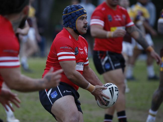 Isaiah Nuimata puts on a play. Photographer: Warren Gannon Photography
