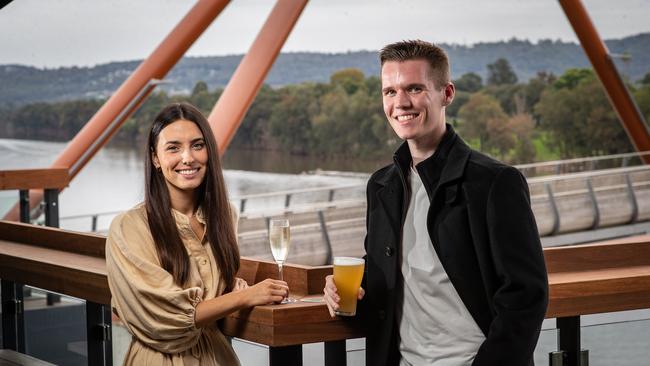 Erin McCumiskey from North Kellyville enjoys a drink with Christian Thompson at the newly built hotel.