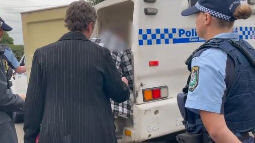 Fakhreddine in the police wagon on the day of his arrest.