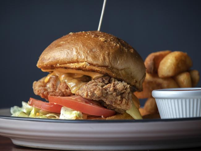 Marigold Cafe in North Hobart, Spicy Chicken Burger with Chips. Picture Chris Kidd