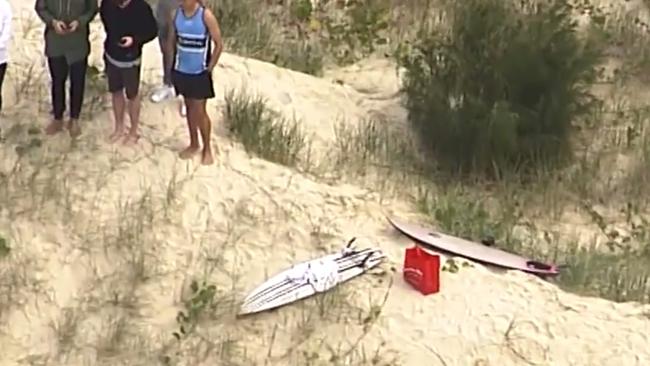 Surfboards lay on the beach in the aftermath of Rob’s fatal shark attack. Picture: 7 NEWS