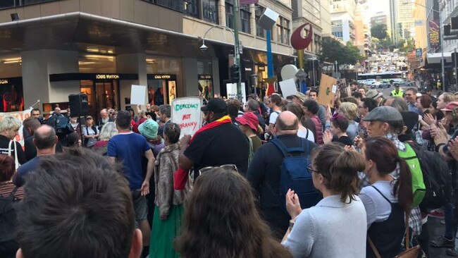 Protesters block the intersections of Margaret and Queen streets in the Brisbane CBD. Picture: 7 News Brisbane