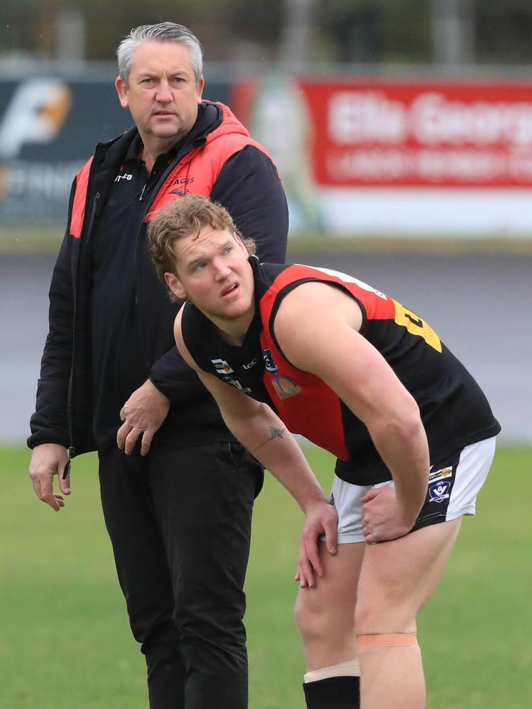 McMahon with player Cameron Wilkinson. Picture: Mark Wilson